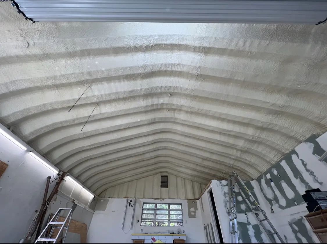 Spray polyurethane foam applied to the underside of a metal roof deck in Vero Lake Estates